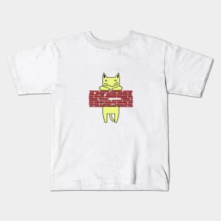 Yellow cat peeking wall Kids T-Shirt